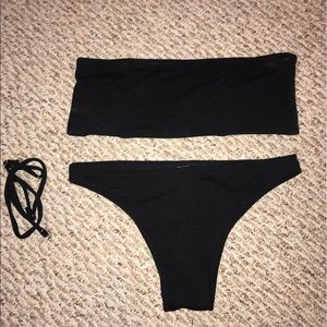 Black bandeau bathing suit with removable straps